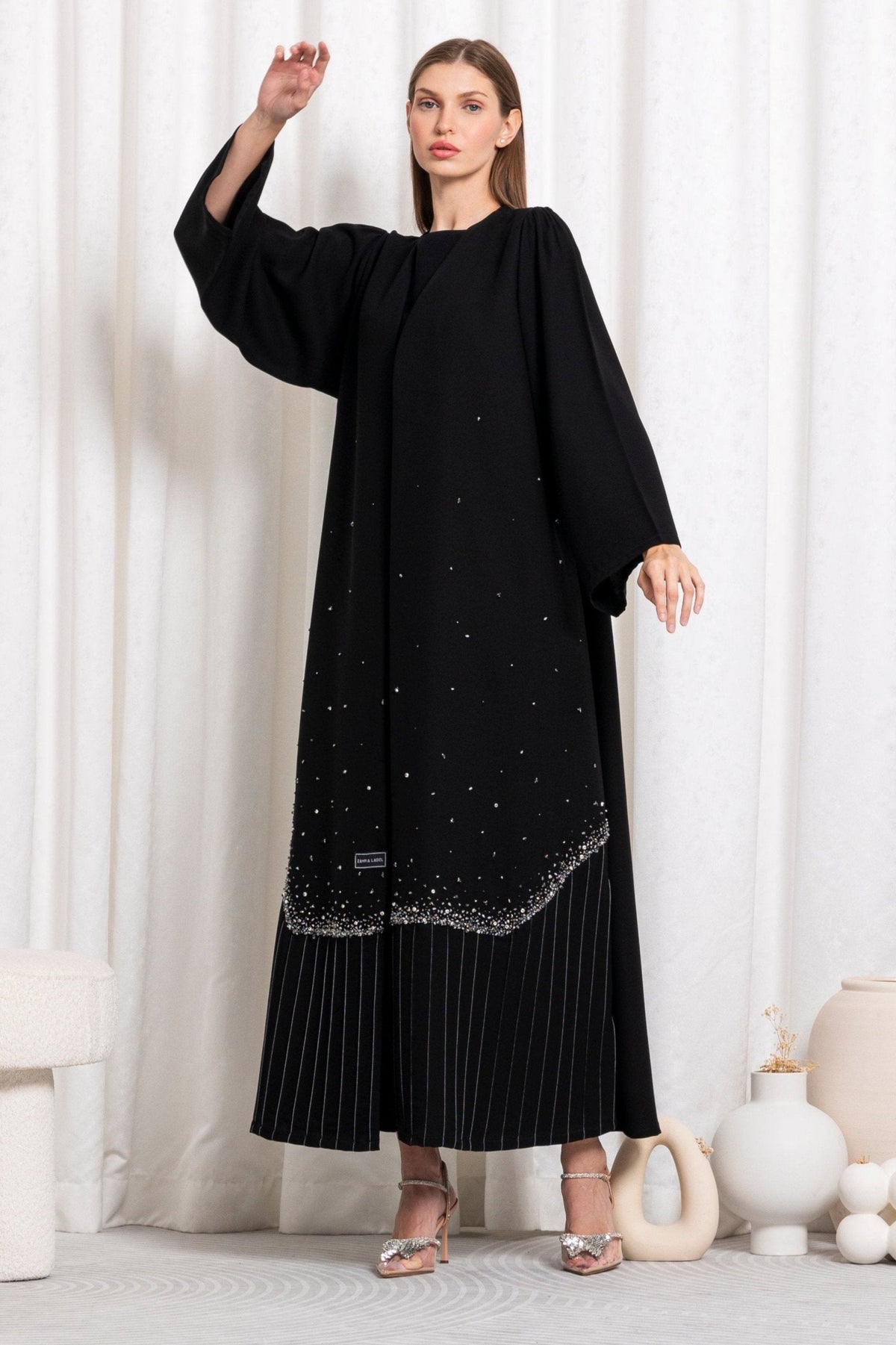 POLLY ABAYA