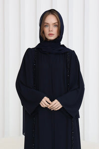 NISREEN ABAYA